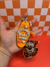 Load image into Gallery viewer, Bouncing into Fall Hundred Acre Friend | Fall Season Hunny Bear Friend | Orange Keychain Accessories | Bag Charms for Fall
