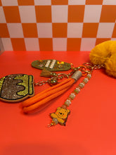 Load image into Gallery viewer, Beary Cozy Hunny Bear Bag Charm | Hunny Pot Bear Fall Season Keychain Accessories | Olive Green Mustard Yellow Orange Purse Charms
