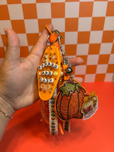 Load image into Gallery viewer, Booked &amp; Cozy Bag Charm | Fall Season Bag Charms | Cozy Book Club Pumpkins Beaded Rope | Rhinestone Pumpkin | Bookish Fall Girly
