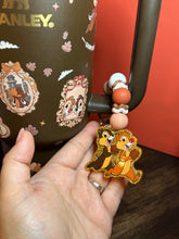 Load image into Gallery viewer, Double Trouble Chipmunks Dark Brown Stanley Gold Trim | Beaded Charm + Matching Acrylic | Stanley Topper Custom
