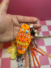 Load image into Gallery viewer, Pua Signature Bag Charm | Tropical Princess Sidekick | Acrylic Charms | Faux Leather Flower | Pom Pom Orange Ocean
