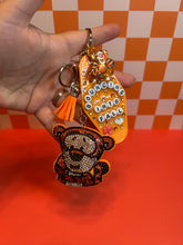 Load image into Gallery viewer, Bouncing into Fall Hundred Acre Friend | Fall Season Hunny Bear Friend | Orange Keychain Accessories | Bag Charms for Fall
