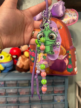 Load image into Gallery viewer, Cute, But Sassy Bag Charm | Pascal + Rapunzel | Castle Inspired Bag Charms | Purple and Green Bag Charm | Magic Inspired
