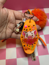 Load image into Gallery viewer, Pua Signature Bag Charm | Tropical Princess Sidekick | Acrylic Charms | Faux Leather Flower | Pom Pom Orange Ocean
