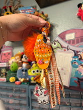 Load image into Gallery viewer, Pua Signature Bag Charm | Tropical Princess Sidekick | Acrylic Charms | Faux Leather Flower | Pom Pom Orange Ocean
